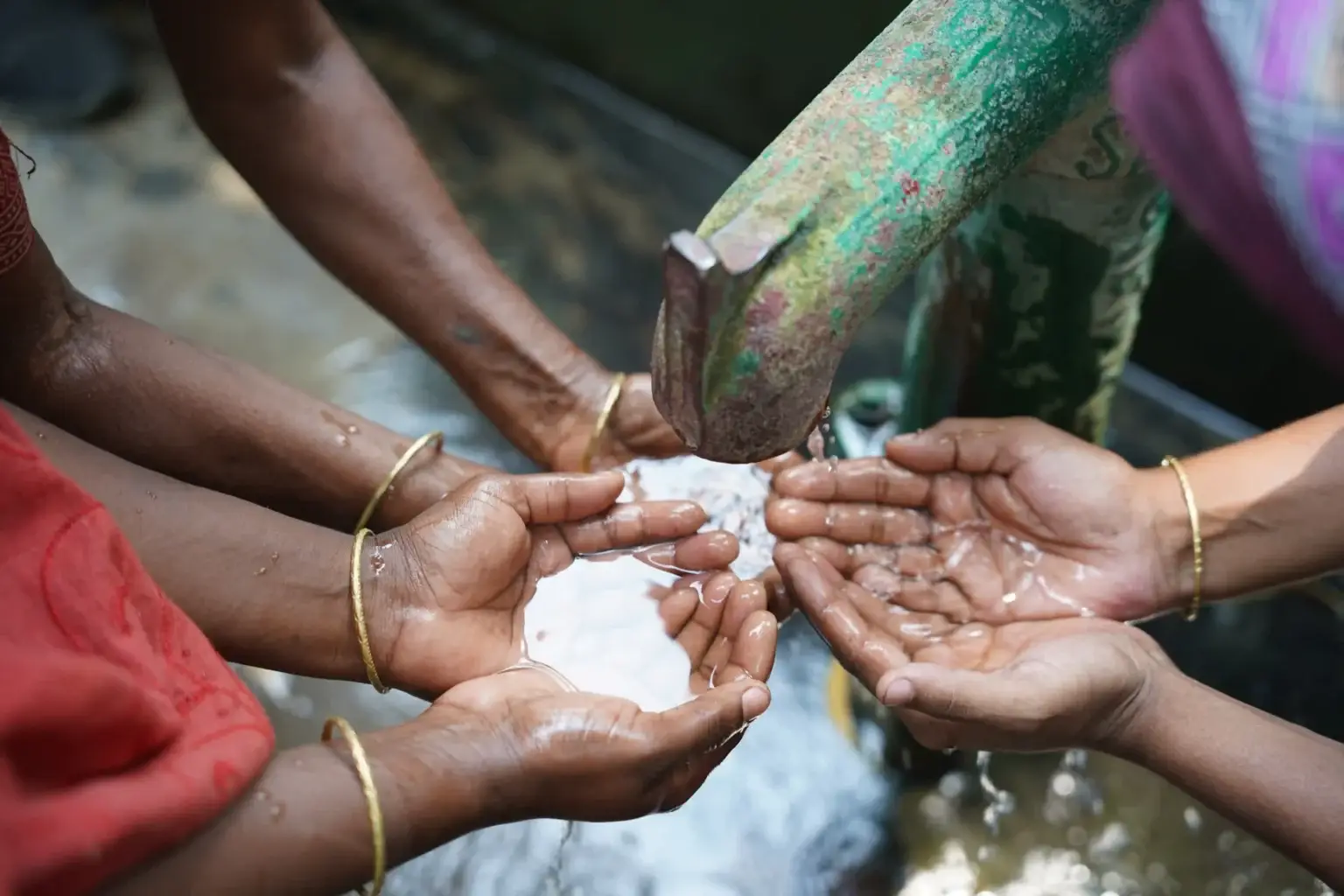 Volunteers distributing aid to families in a rural Bangladeshi community