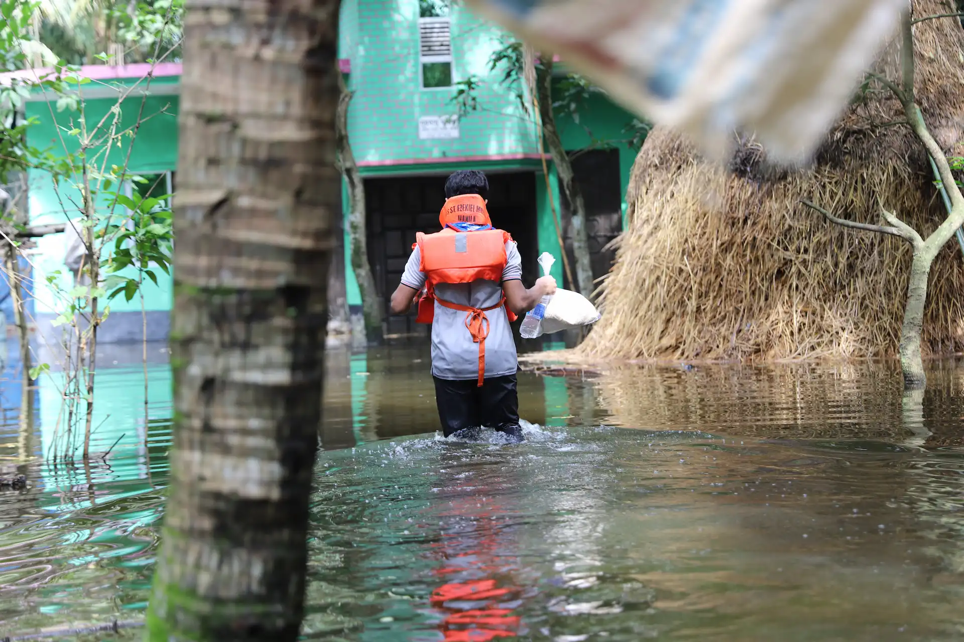 Smallholder farmer working cropland in a river-delta char region