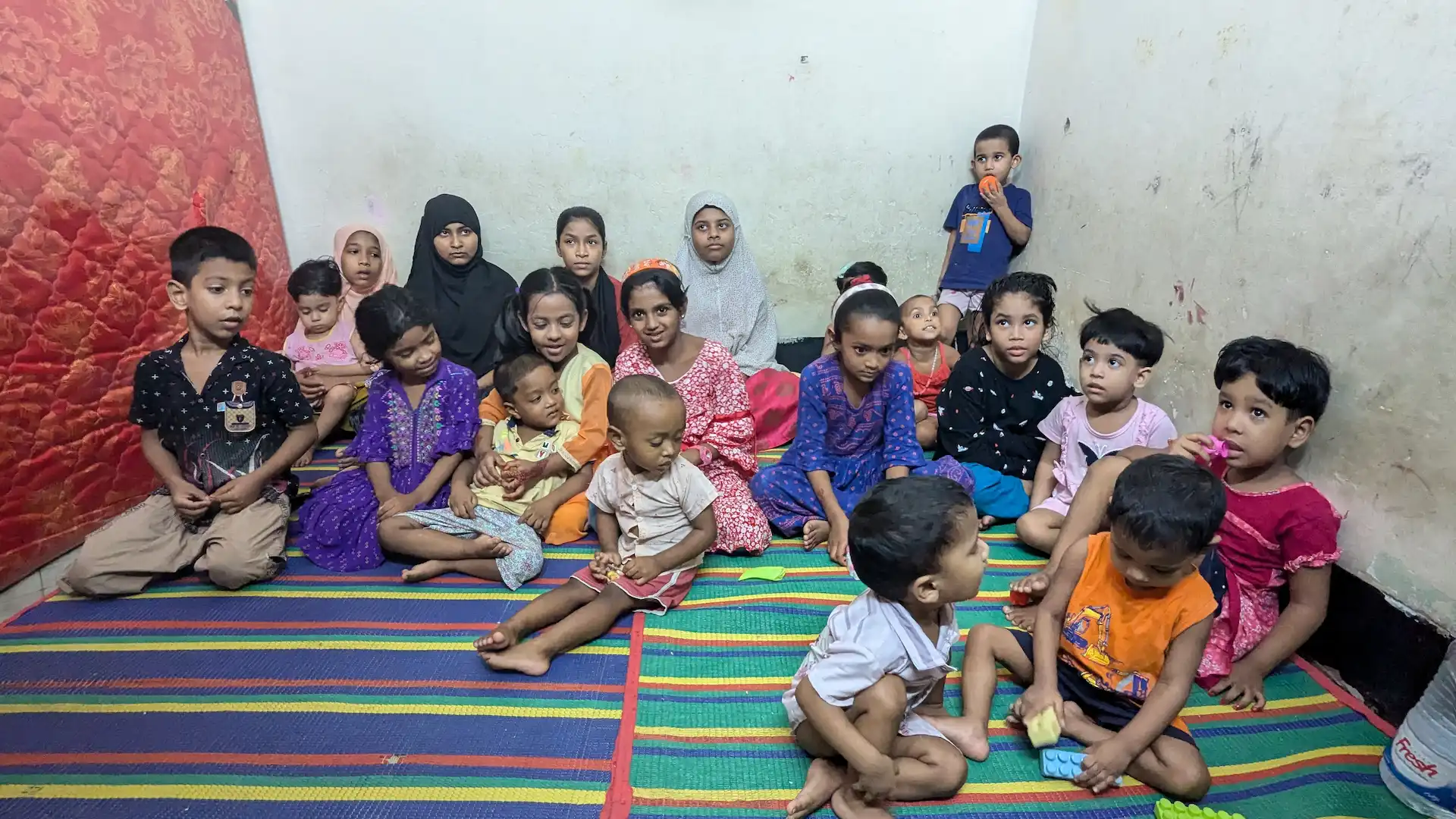 A trained birth attendant supporting a mother on the chars