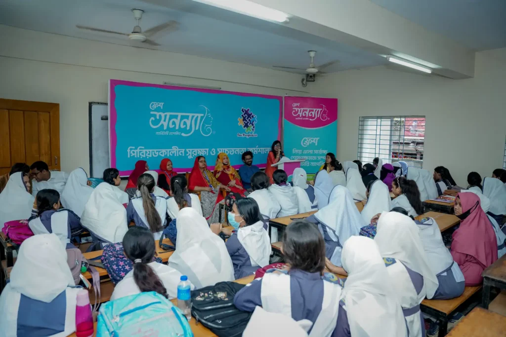 Women and teens in a menstrual health awareness session