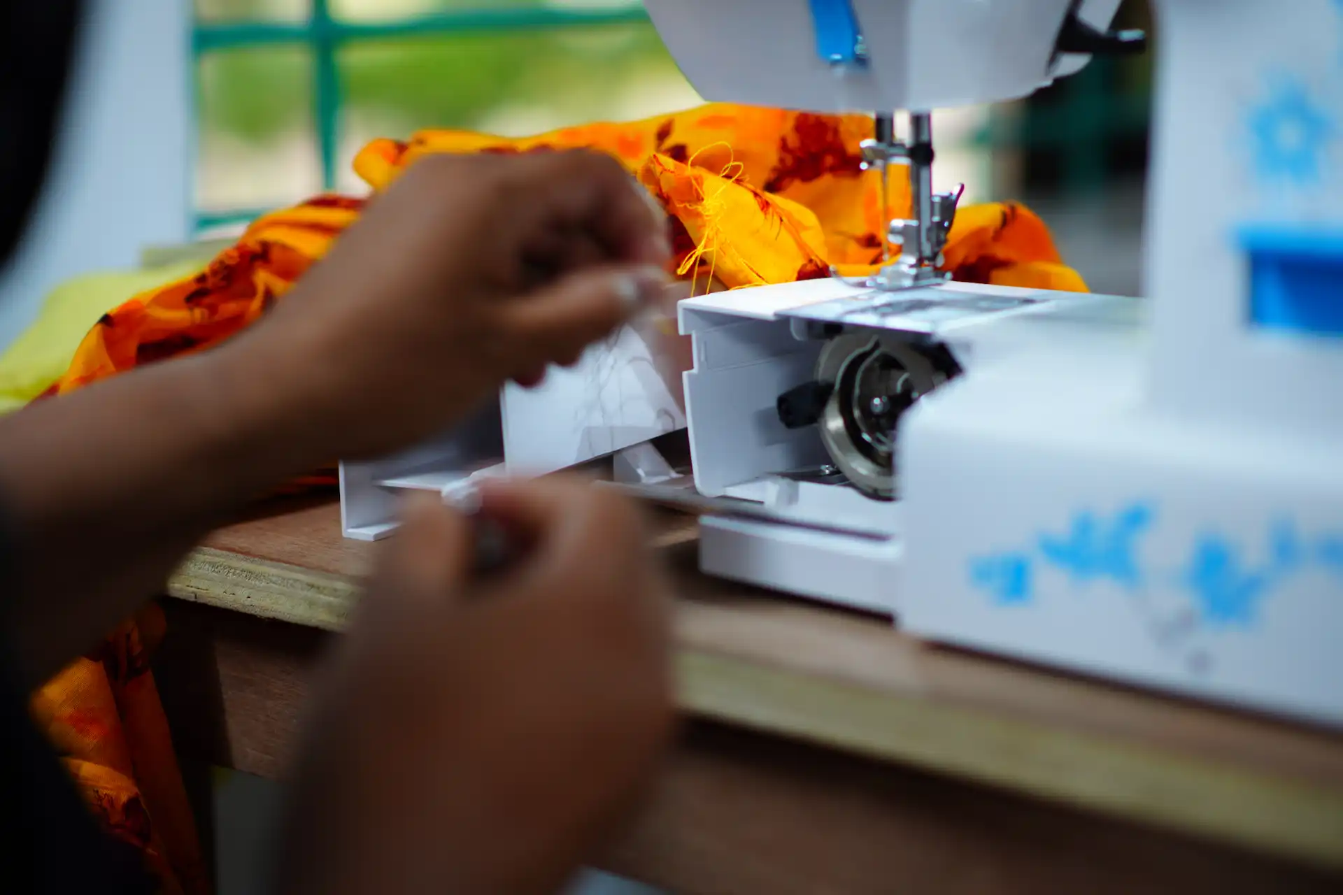 A woman running a small grocery enterprise in a coastal community
